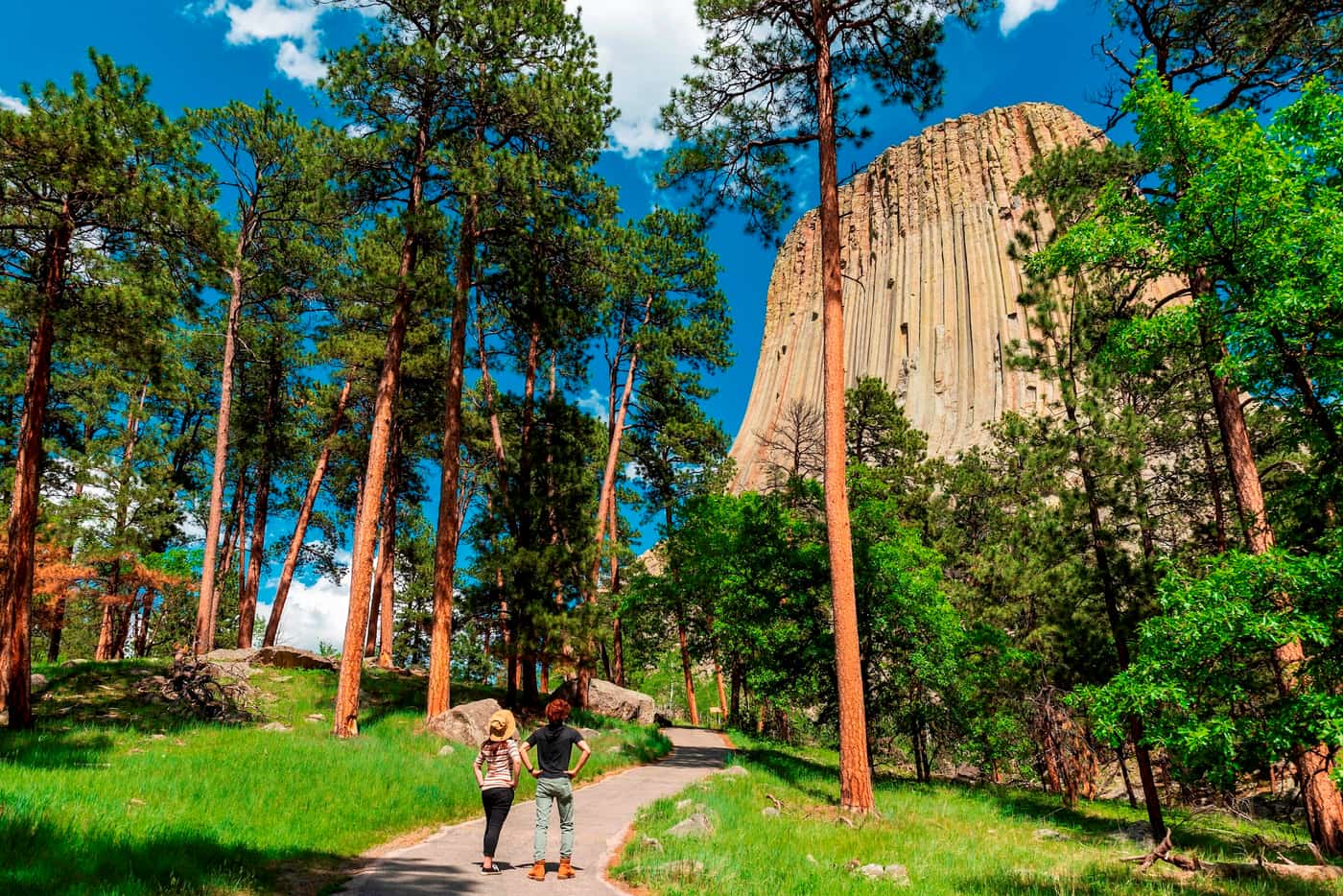 Two people looking at Devils Tower, USA