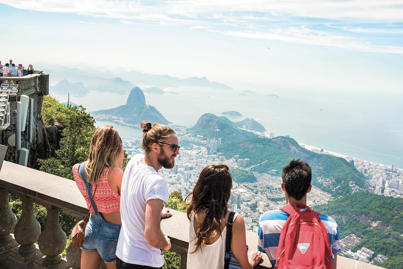 Travellers at Christ the Redeemer Platform in Rio de Janeiro, Brazil