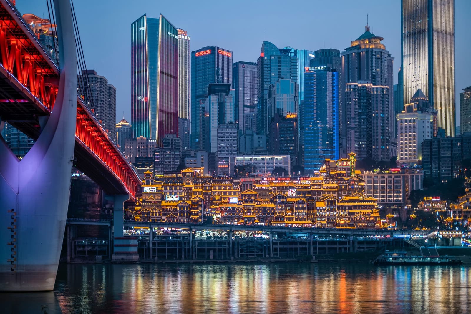 Chongqing skyline at twilight reflecting in water, Chongqing, China