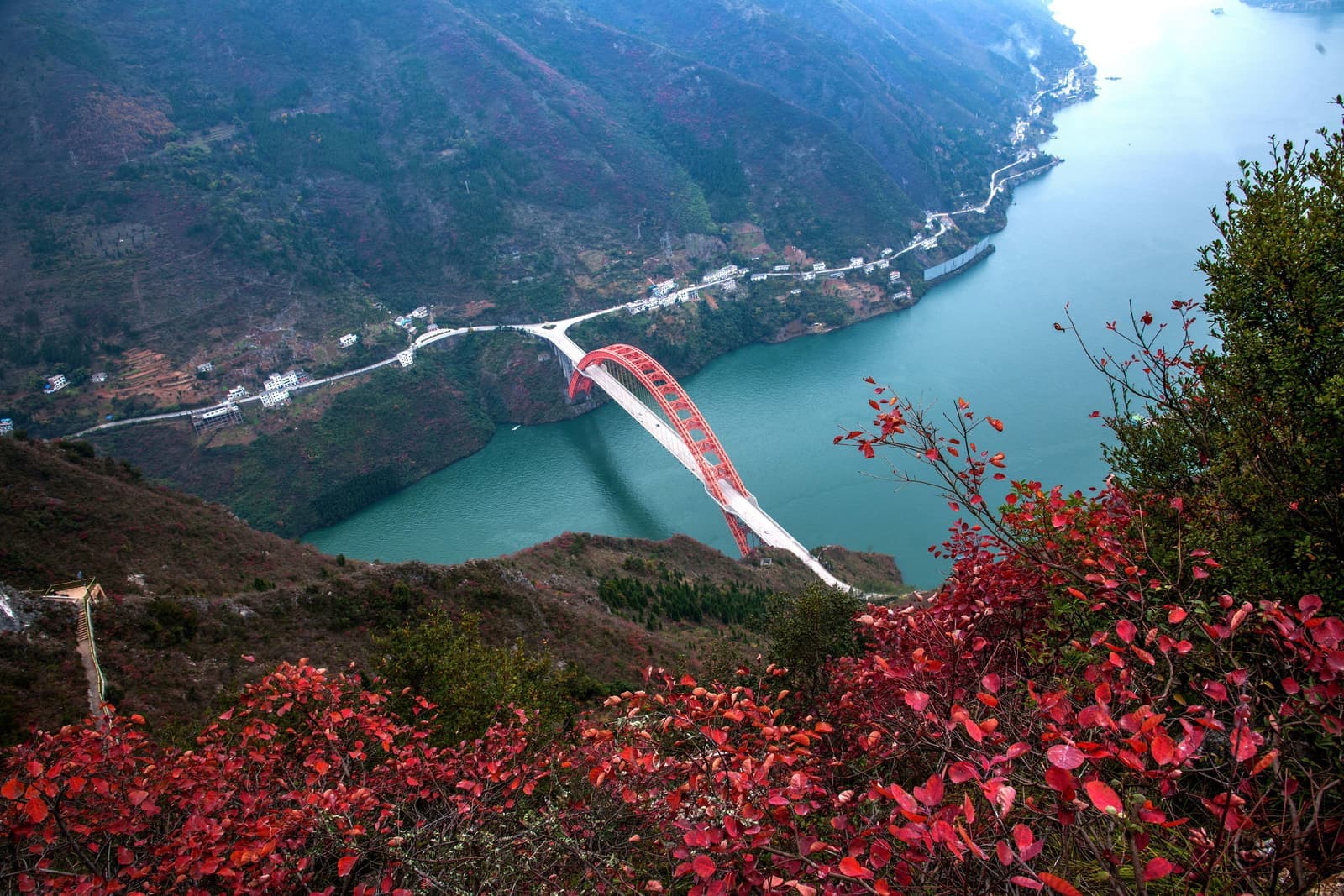 Scenic view of red bridge and fall foliage on Yangtze River, China