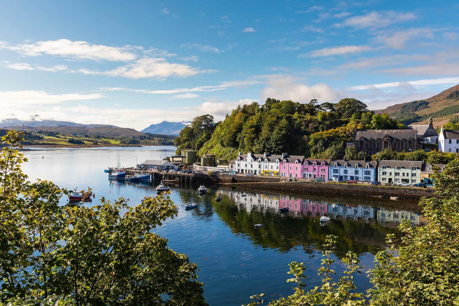 Colourful waterfront houses in Portree on Isle of Skye overlooking harbour