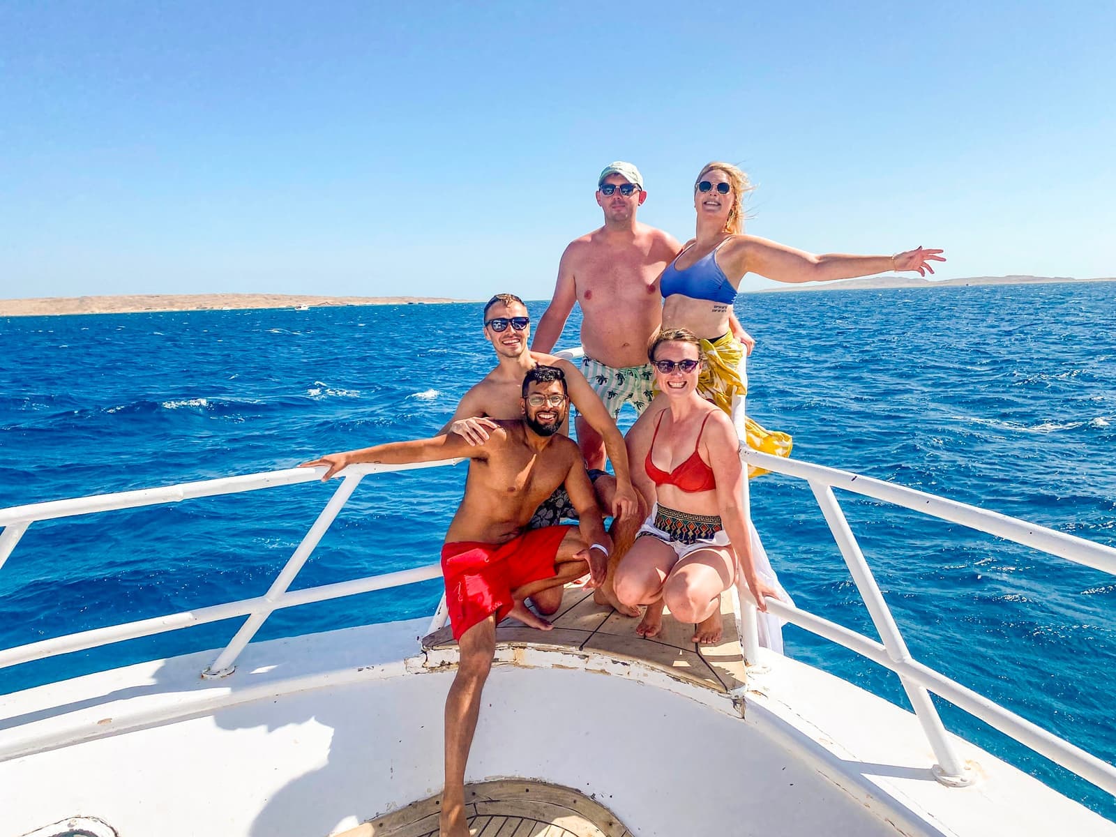 Travellers swimming in the Red Sea at Hurghada in Egypt