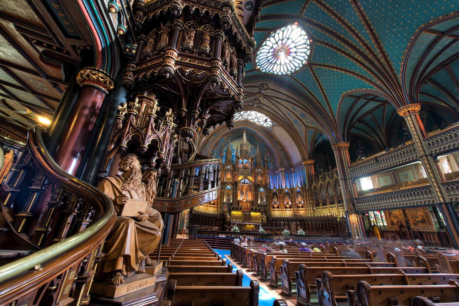 Visitors inside the Notre Dame Basilica in Montreal, Canada