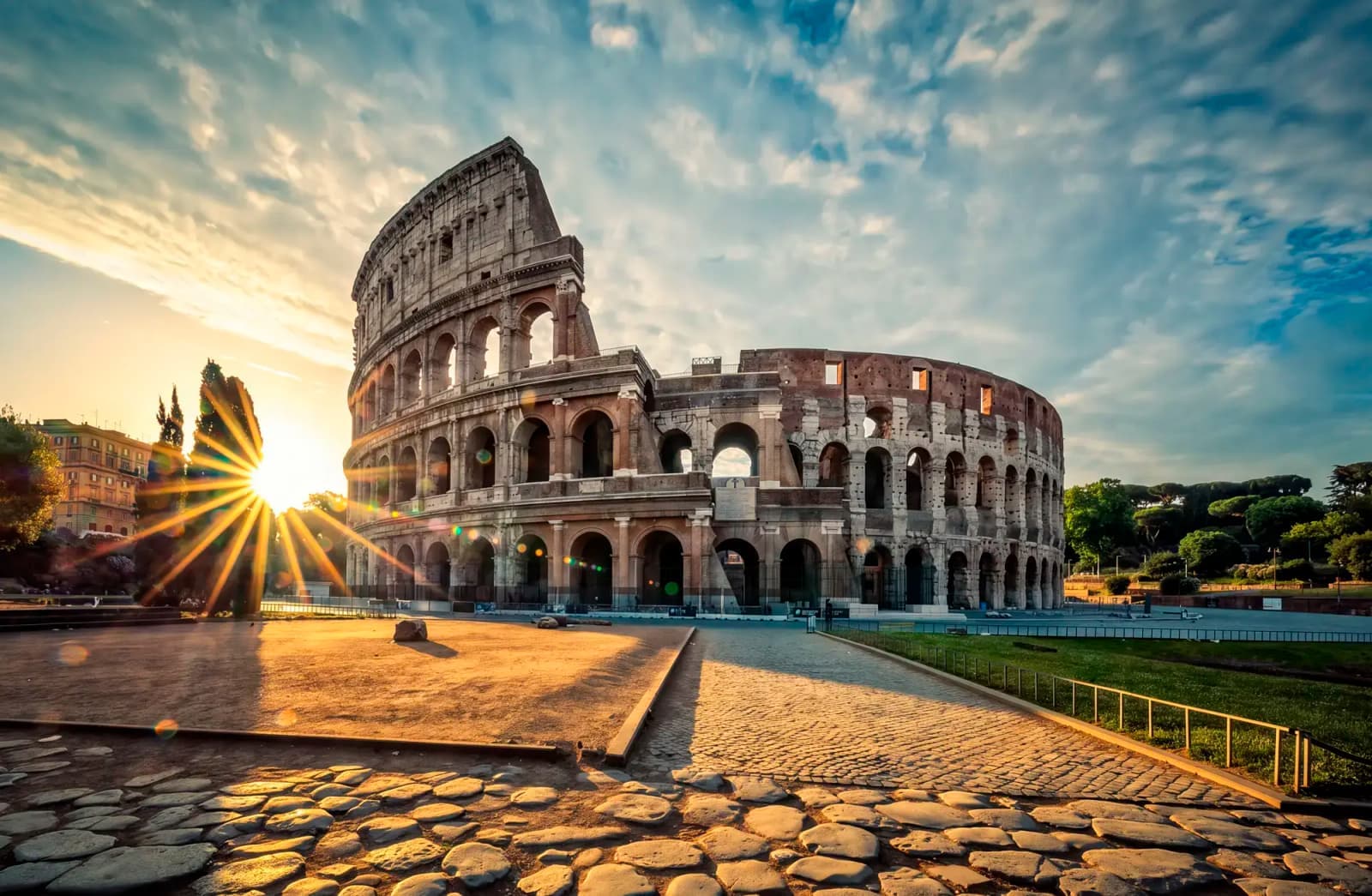 The Colosseum at sunrise in Rome, Italy.