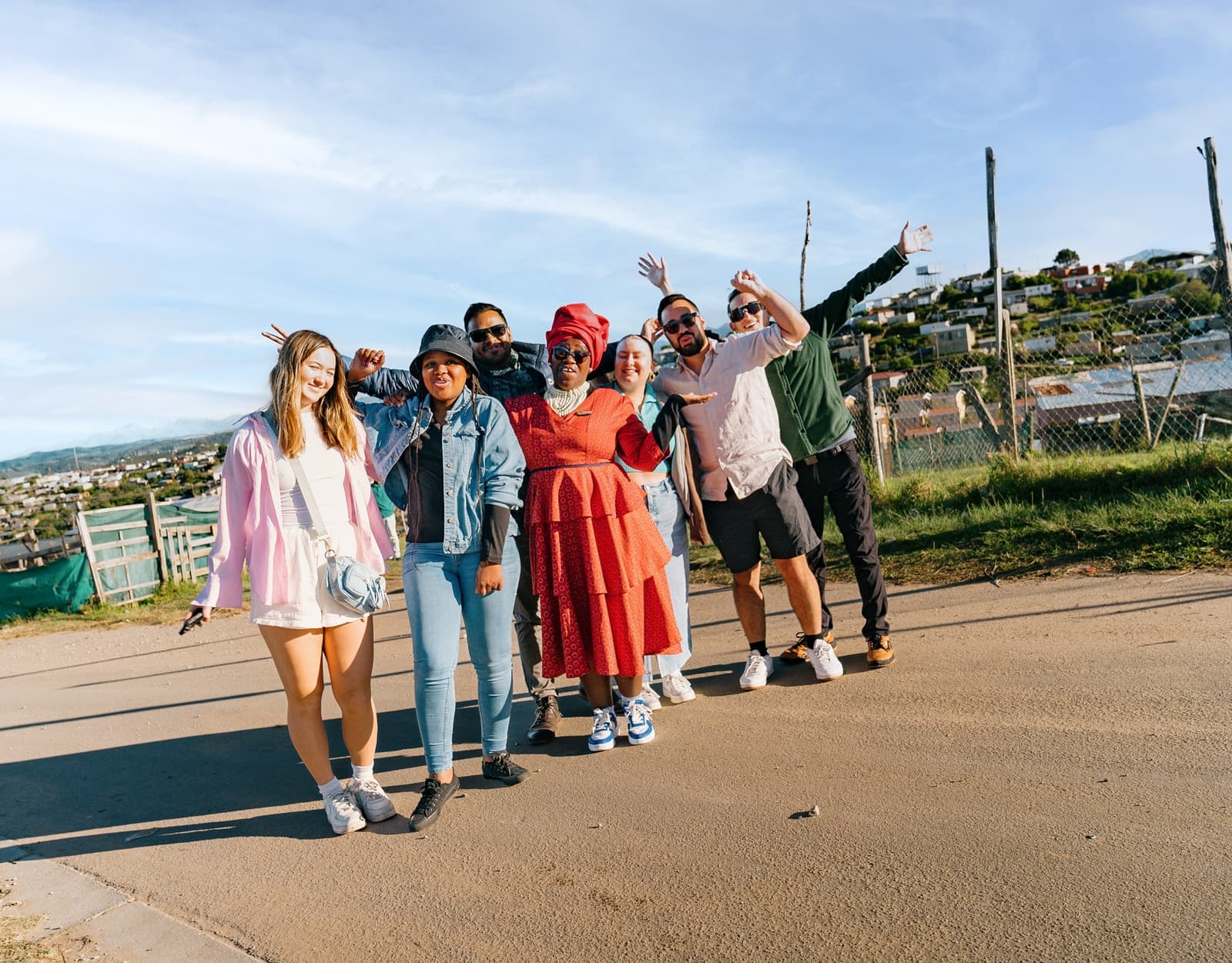 Travellers Posing with Township Tour Host, Knysna, South Africa