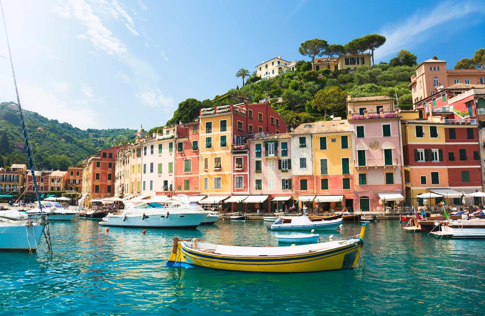 Colourful waterfront buildings and boats in Portofino, Italy