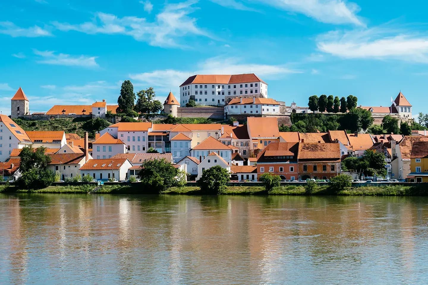 View of Ptuj heritage area and Castle across the Drava River