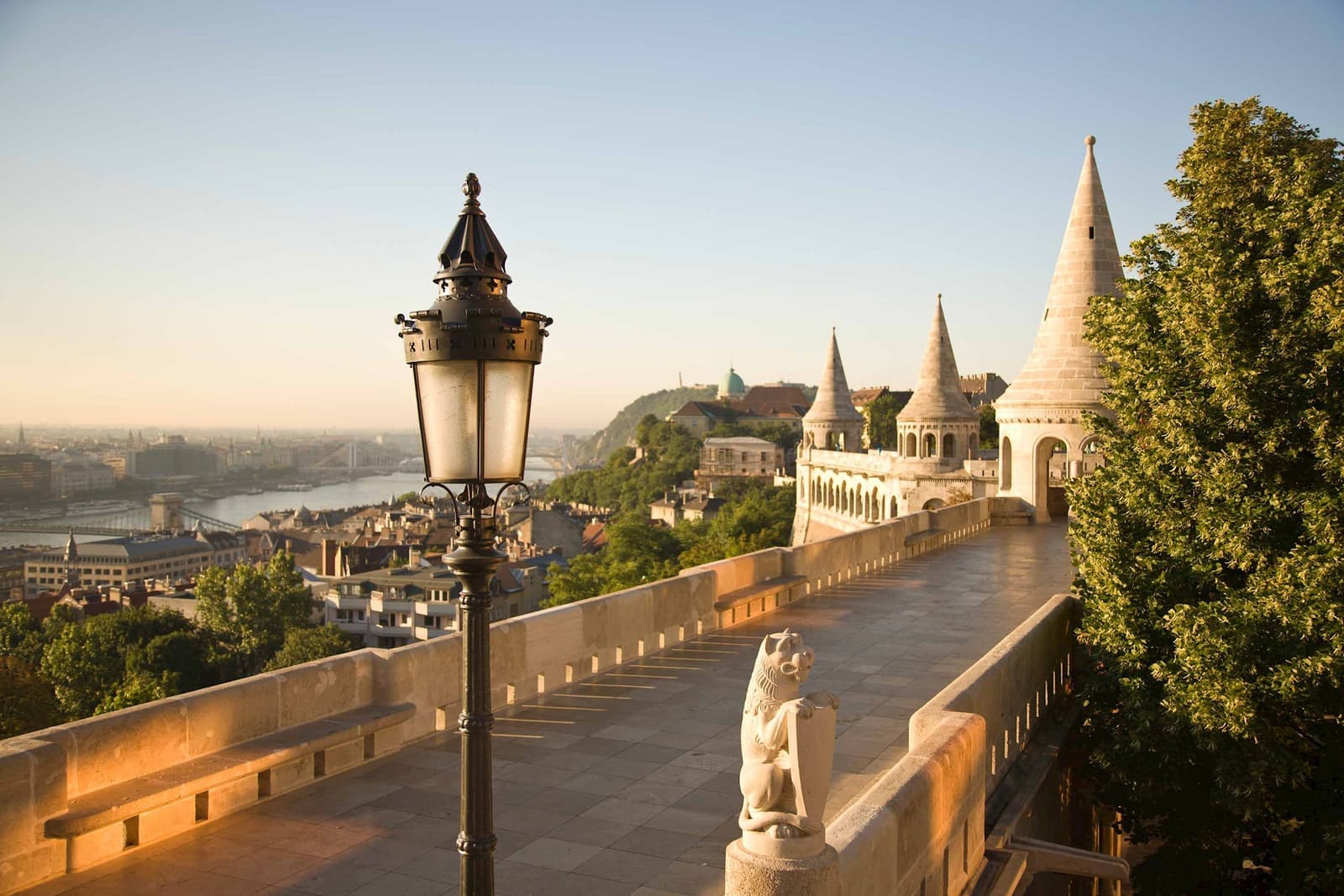 Stone terrace at Fisherman’s Bastion with towers, lion and Danube River view