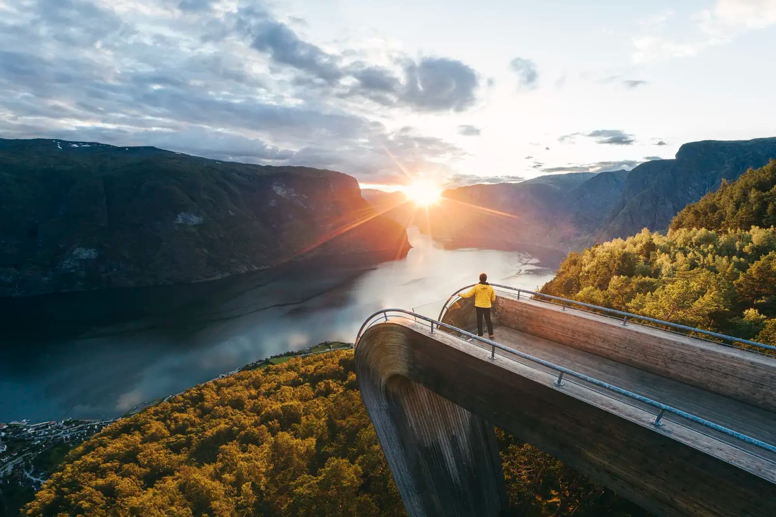 Day Hero Tourist admiring the sunset, Sognefjord, Norway