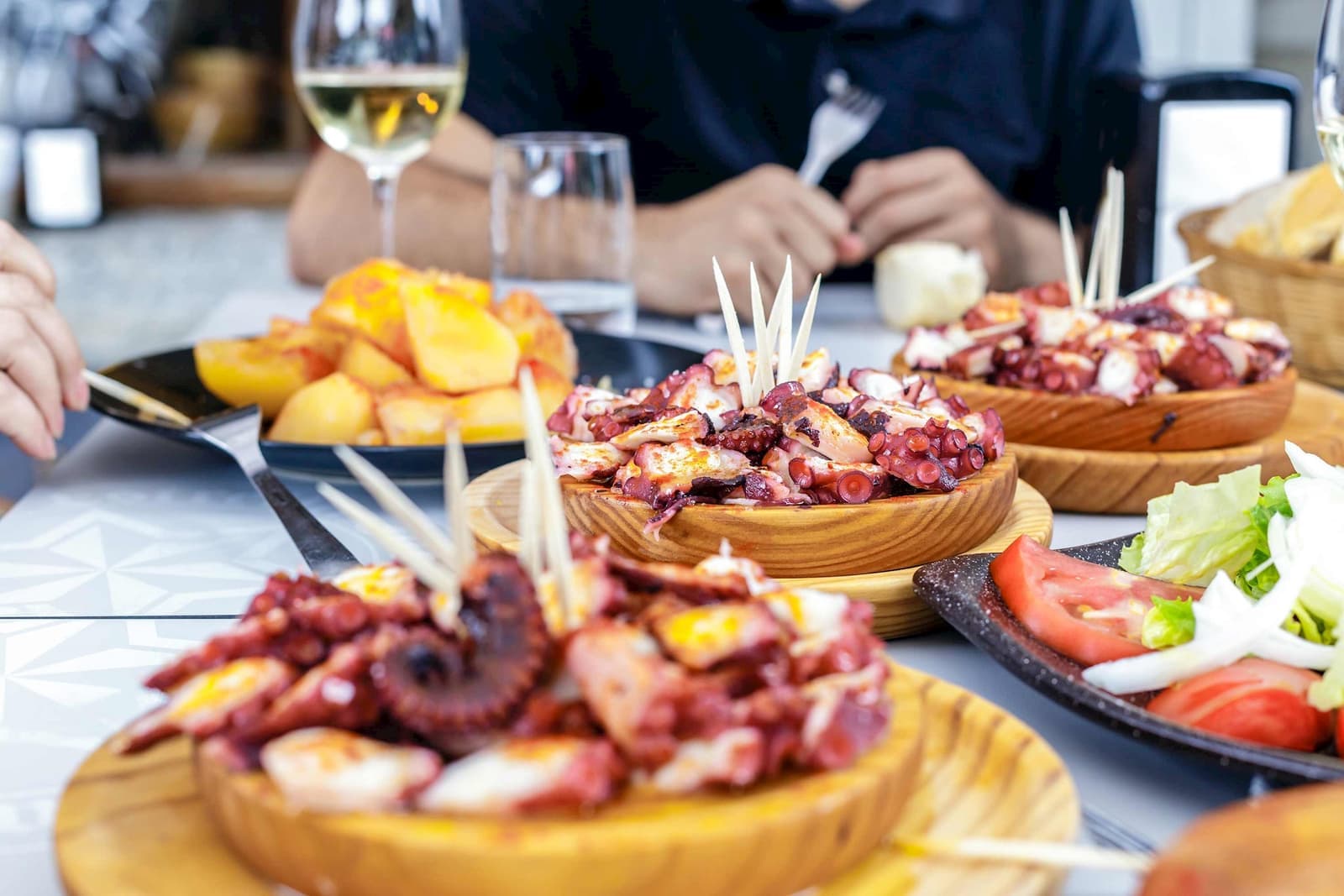 A Spanish dinner featuring Galician-style octopus