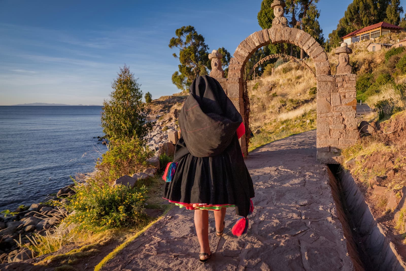 Woman a wool by hand on Taquile Island, Lake Titicaca, Peru
