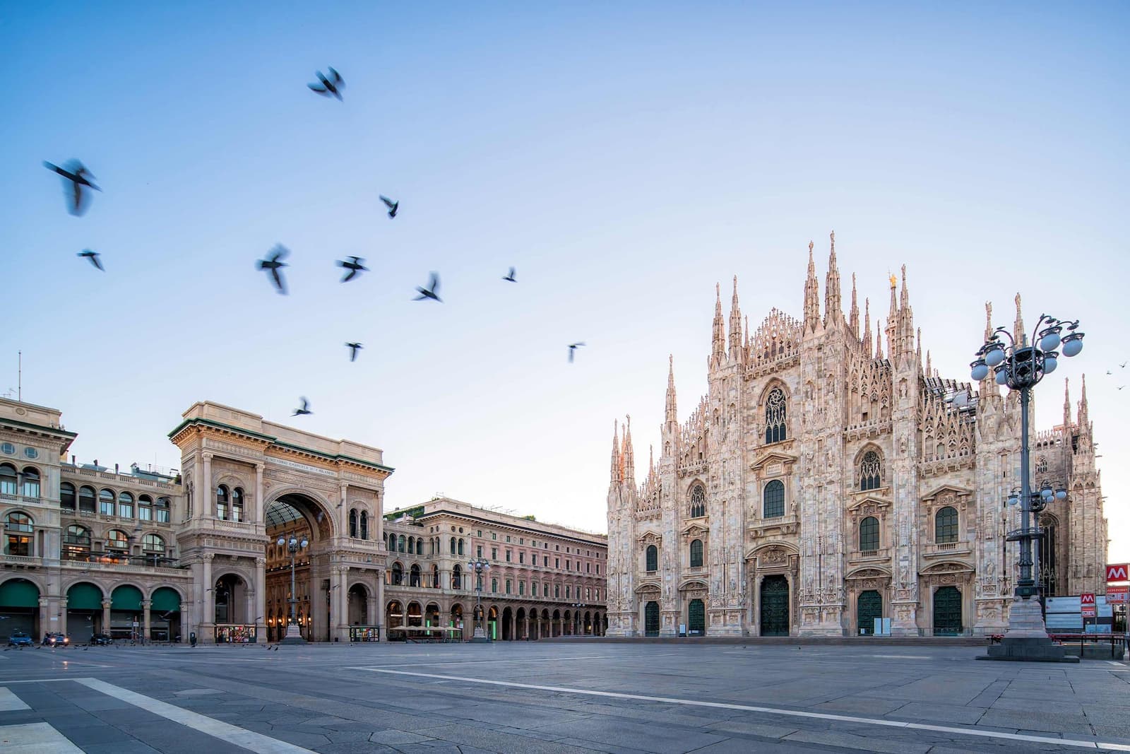 Birds flying over the Milan Cathedral