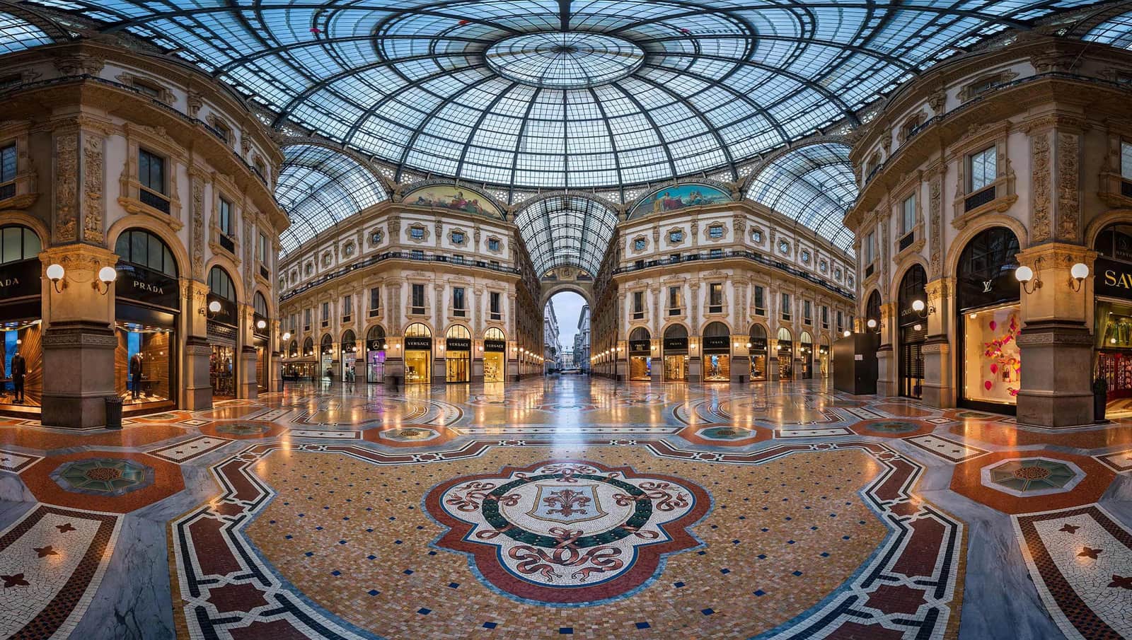 Interior view of Galleria Vittorio Emanuele II with glass dome in Milan