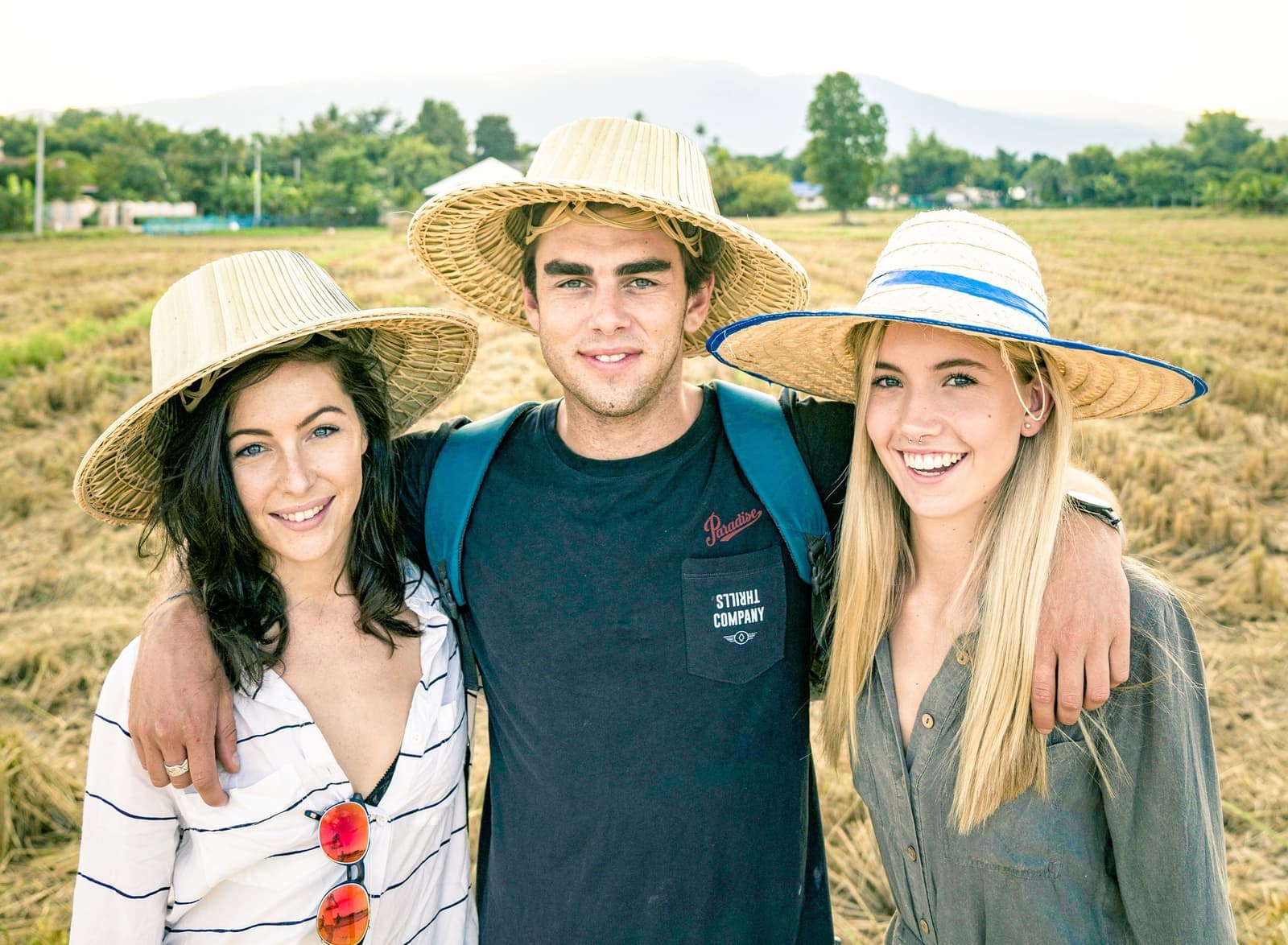 Travellers wearing straw hats in Chaing Mai