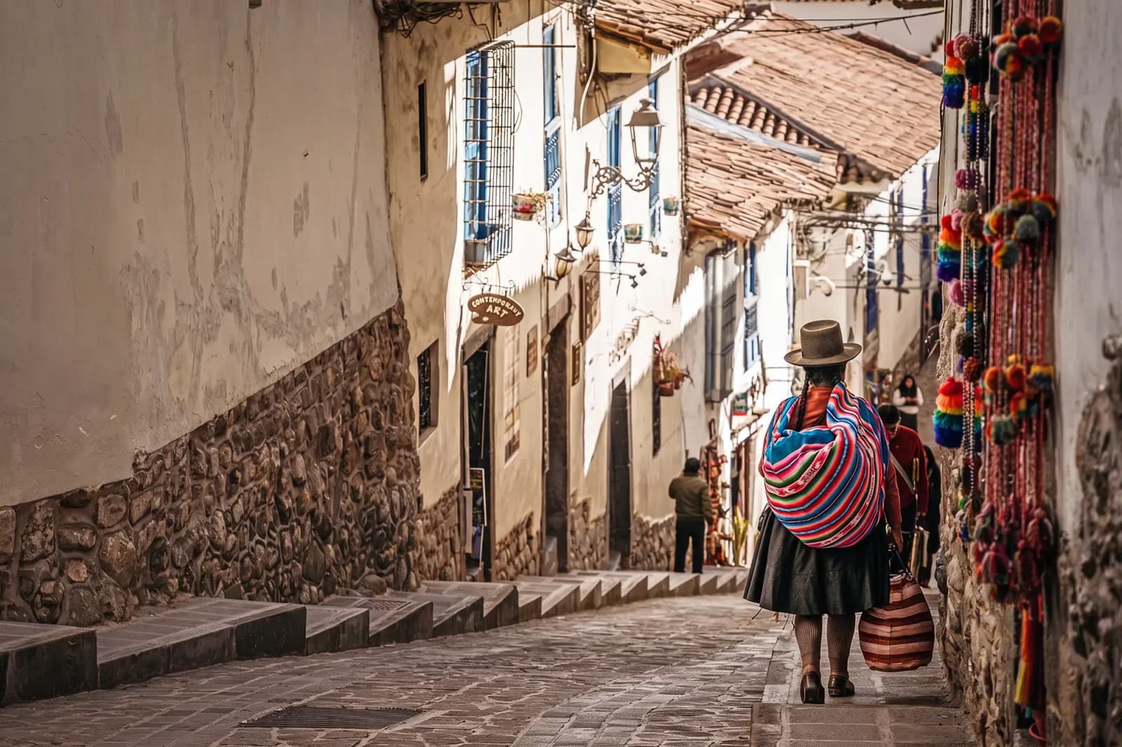 Day Hero Woman Walking On A Steep Cobblestone Street, San Blas, Peru