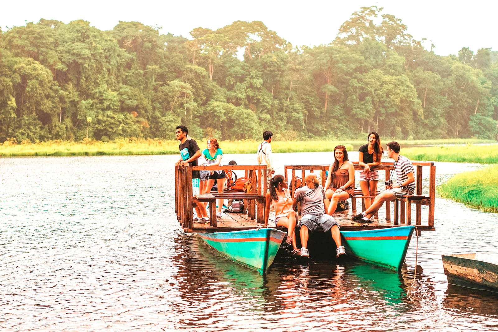 Travellers on a boat in Puerto Maldonado, Peru