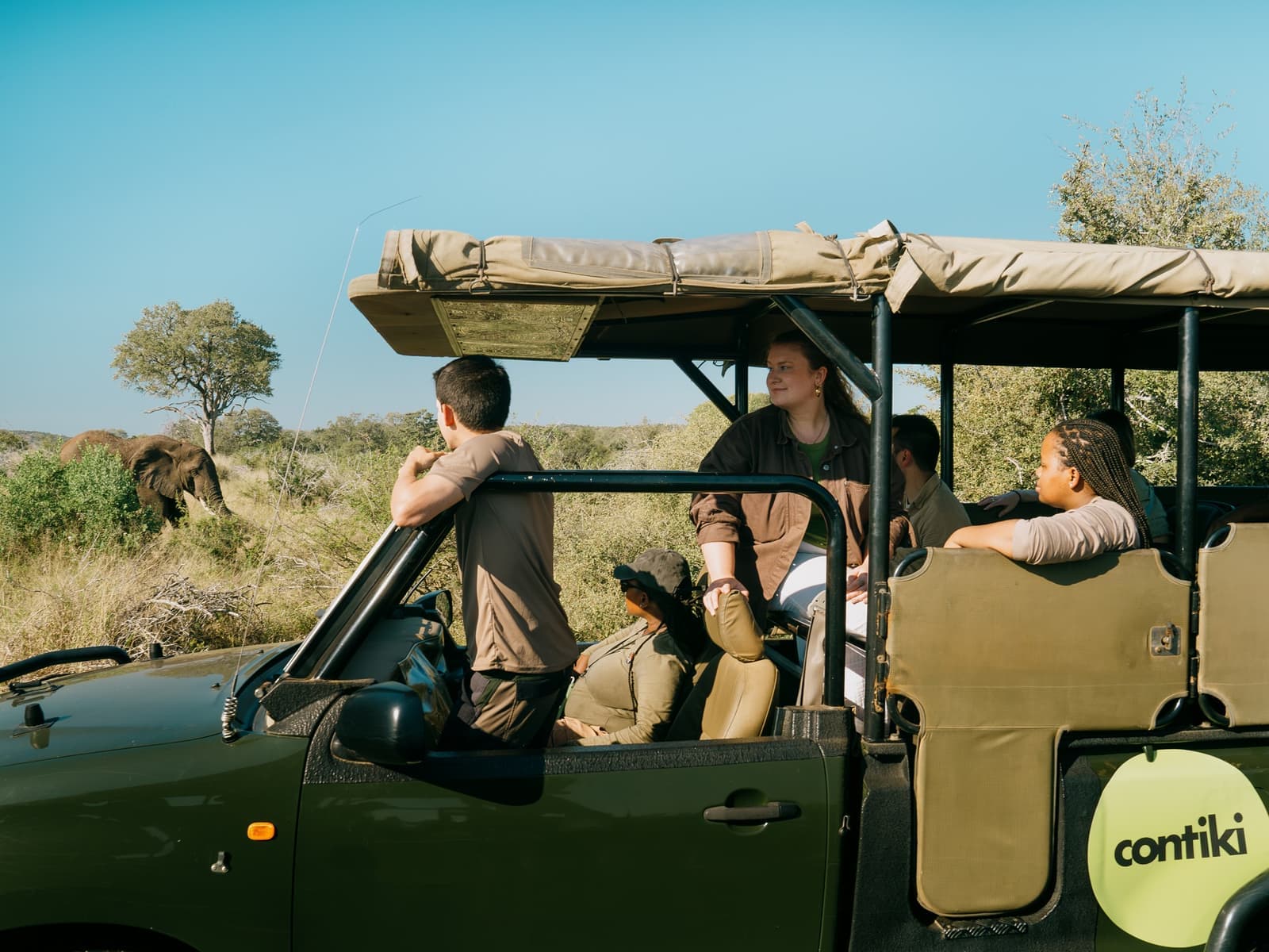 Safari Vehicle of Travellers taking Game Drive, Kruger National Park, South Africa
