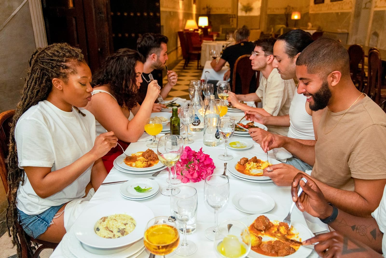 Travelers Enjoying a Dinner at Hotel el Monasterio de San Francisco, Cordoba, Spain
