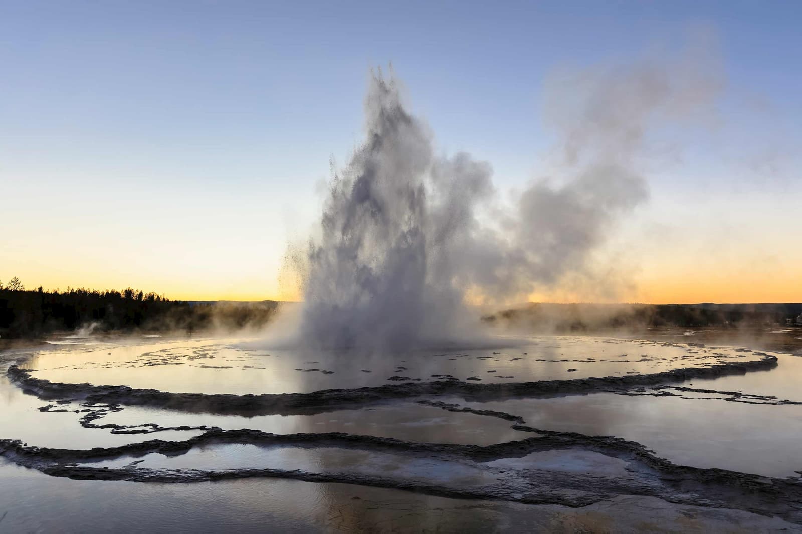 Geyser erupting in the Lower Geyser Basin, Yellowstone National Park, Wyoming, USA