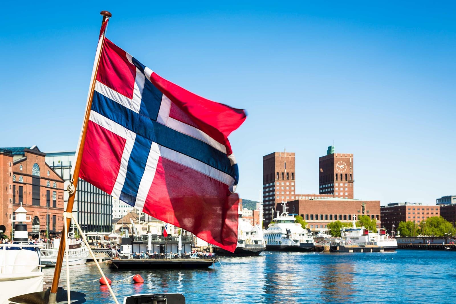 Flag infront of City Hall and Marina in Oslo, Norway