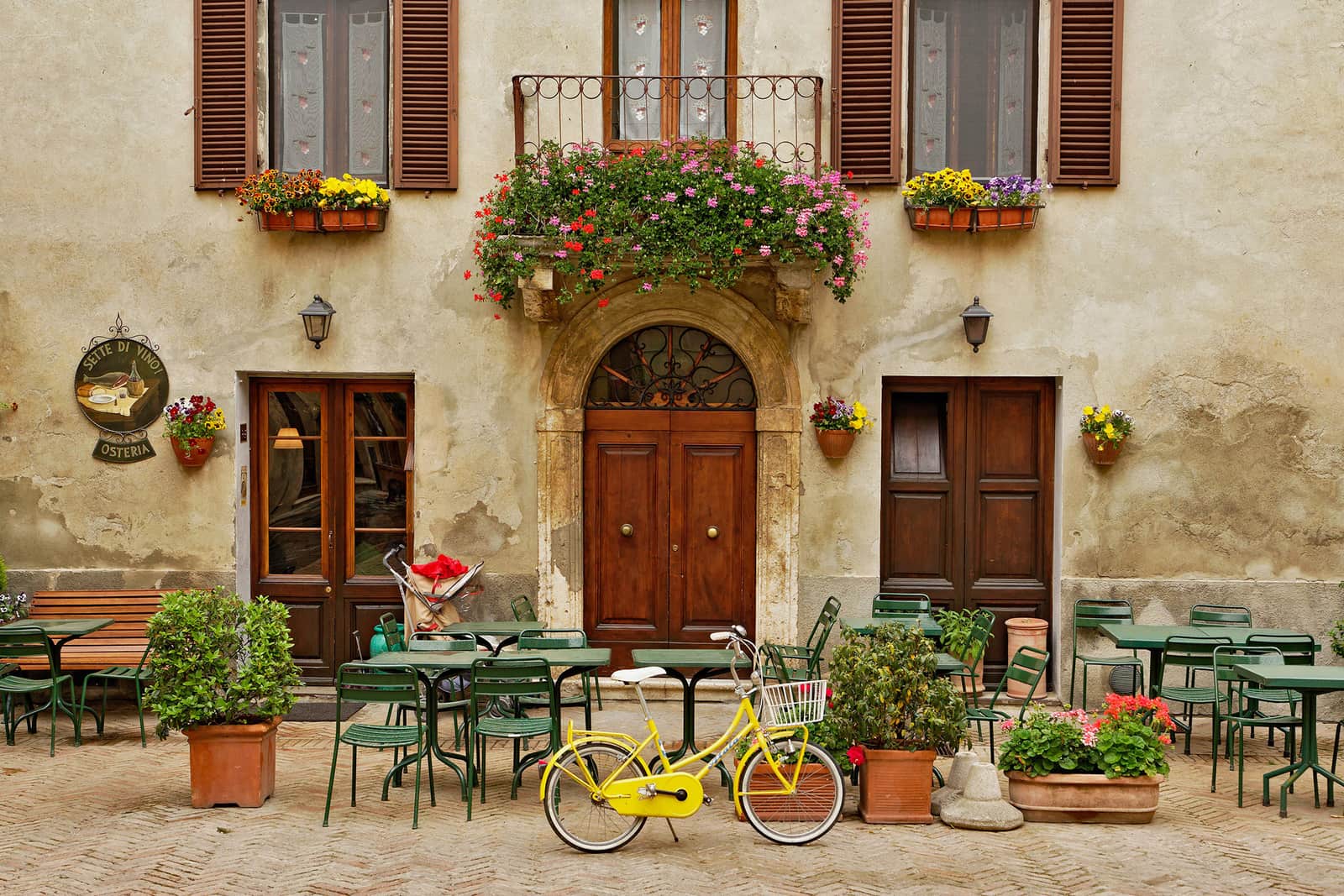Bicycle in Front of a Small Cafe in Tuscany