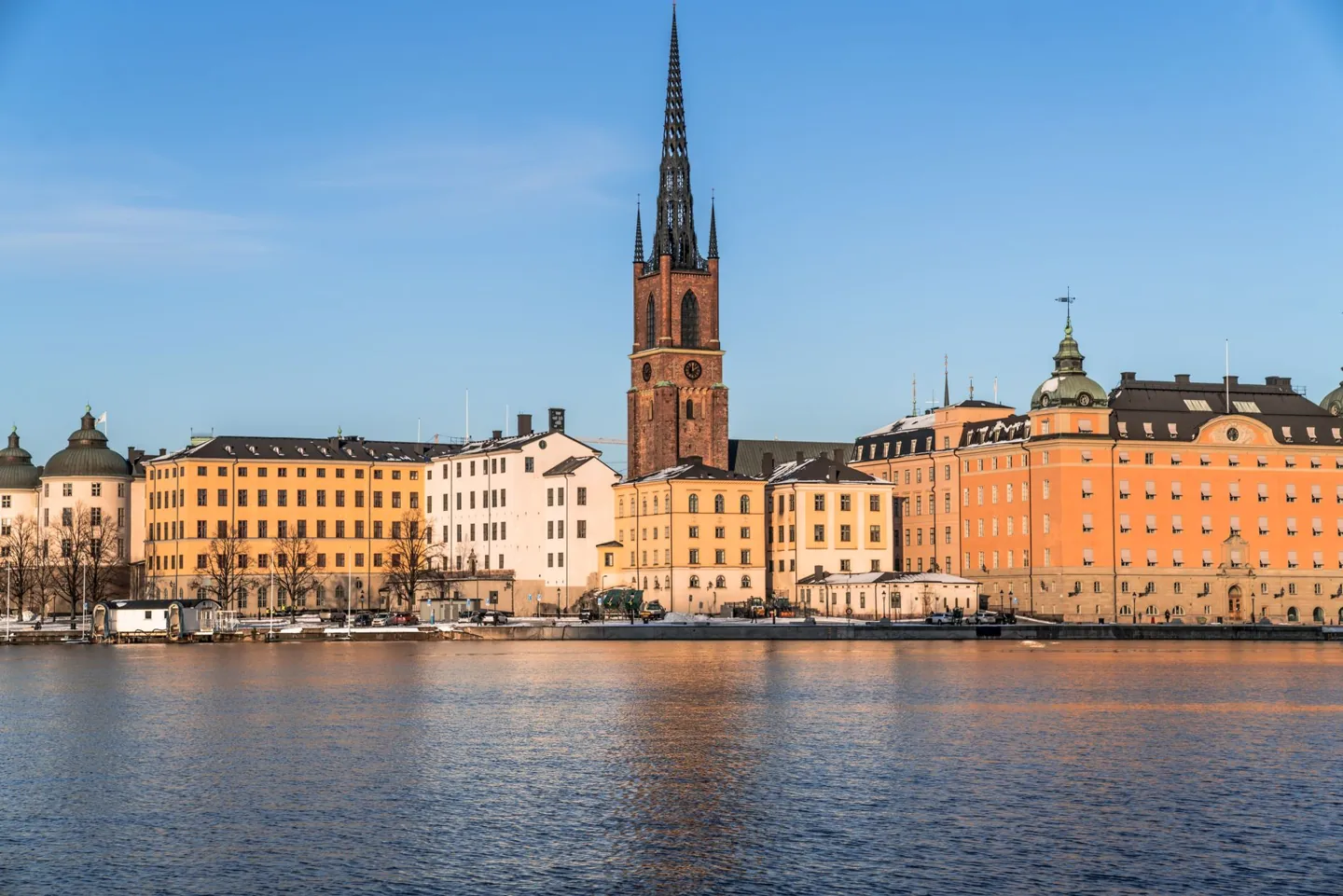 Explore the historic waterfront of Stockholm with its stunning architecture and serene waterscape.